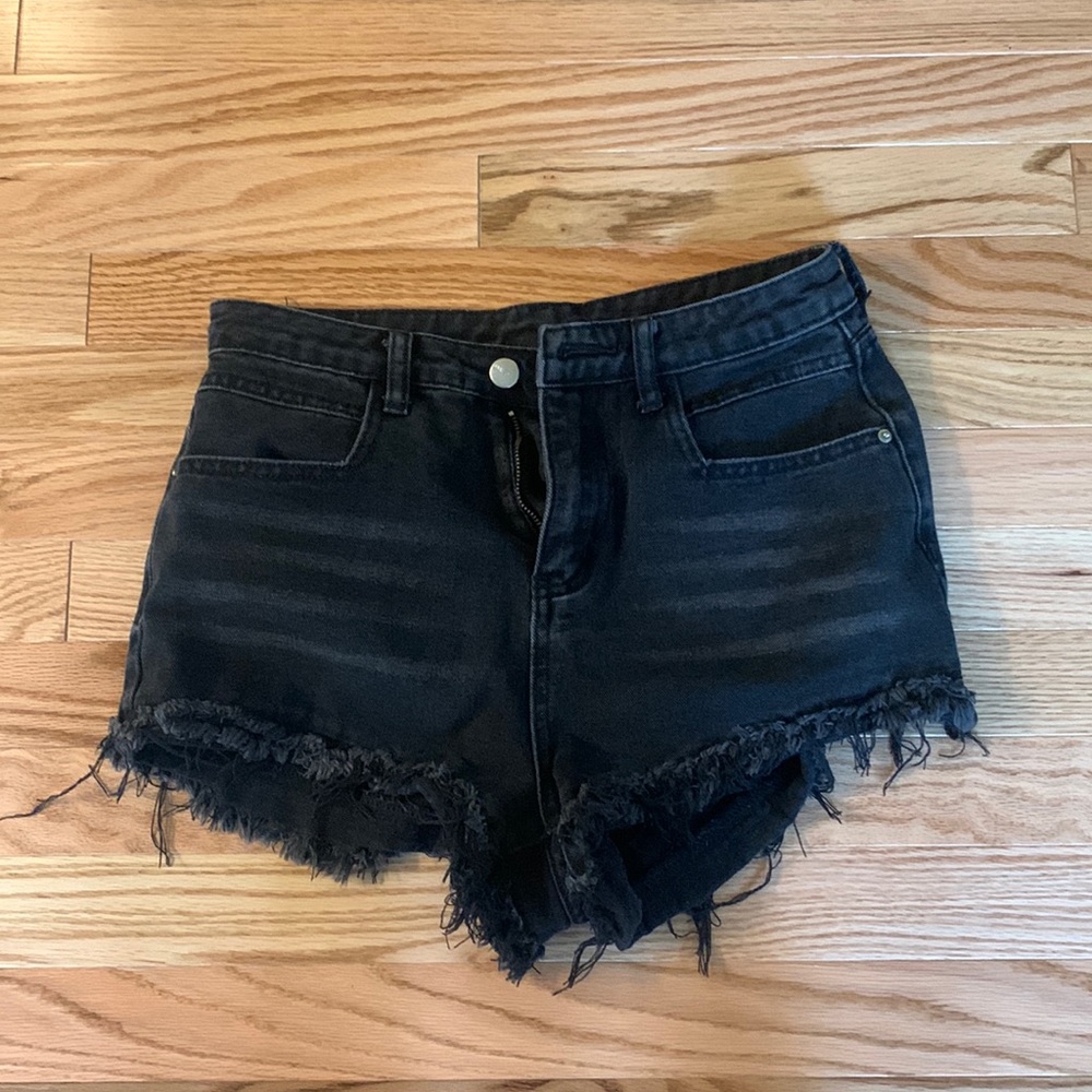 Distressed black jean shorts